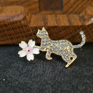Sparkling Cat Brooch with Pink Flower Accent